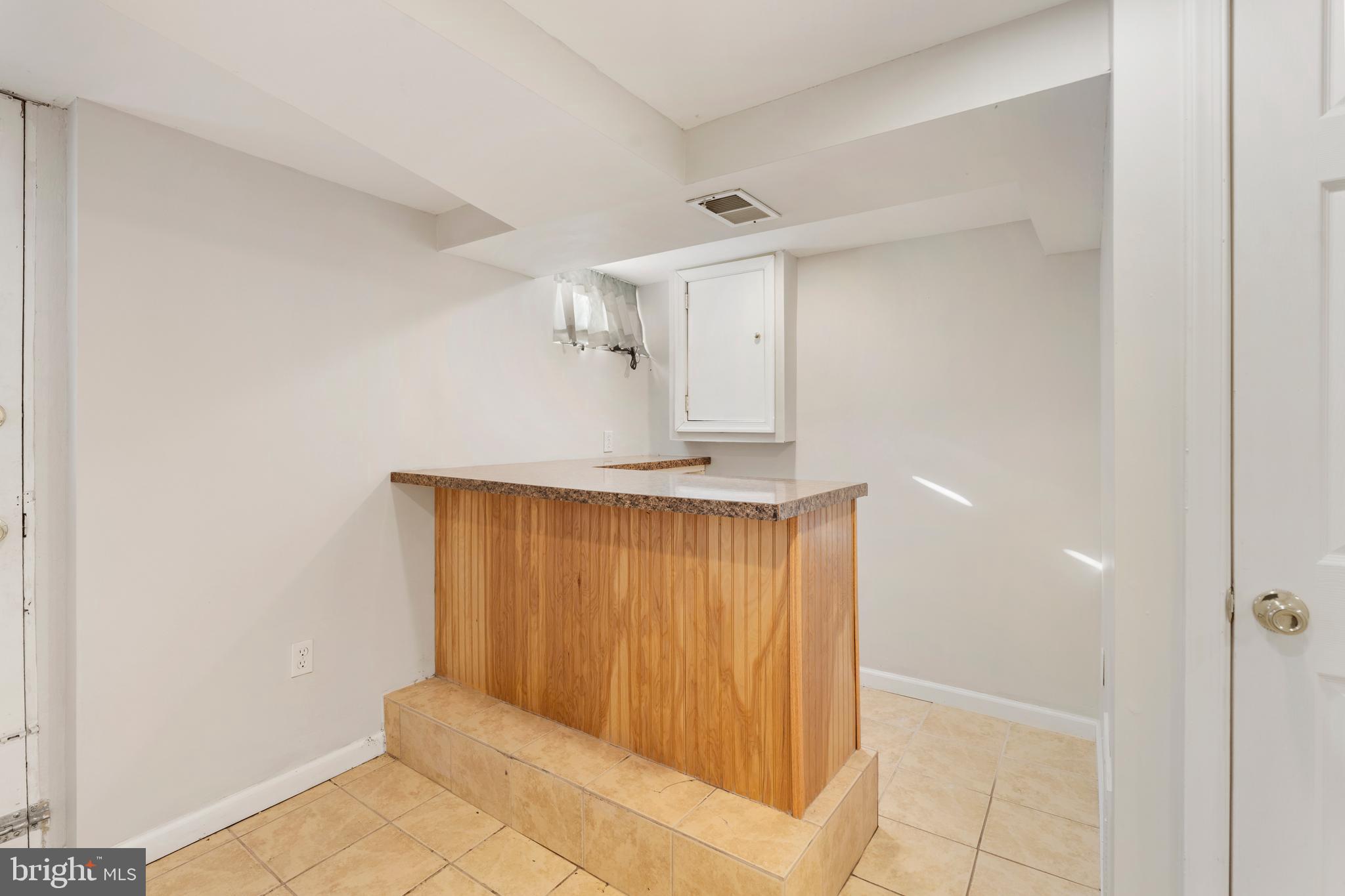 404 Grovethorn Road Baltimore, MD 21220 - Photo 29 of 39 a view of entryway with wooden floor