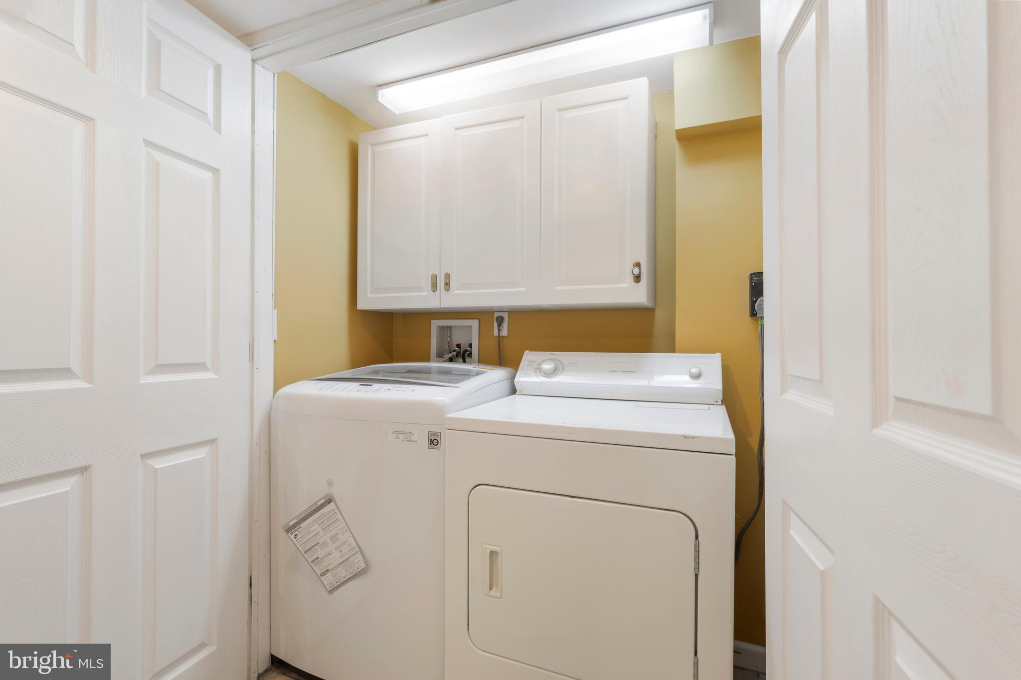 404 Grovethorn Road Baltimore, MD 21220 - Photo 32 of 39 a utility room with dryer and washer