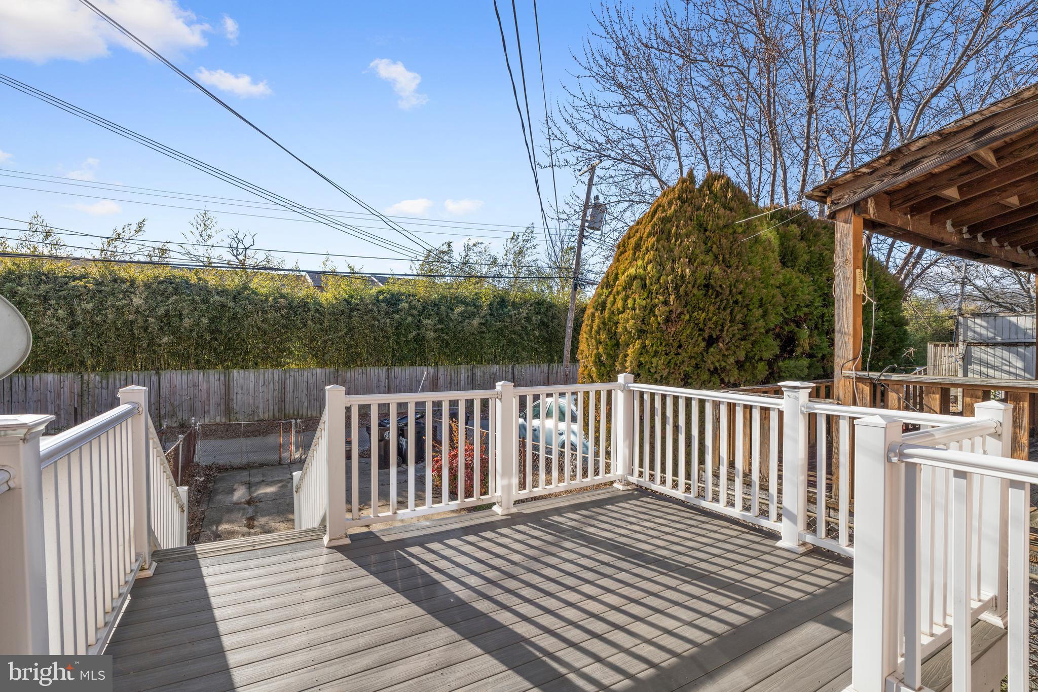 404 Grovethorn Road Baltimore, MD 21220 - Photo 35 of 39 a view of a wooden deck