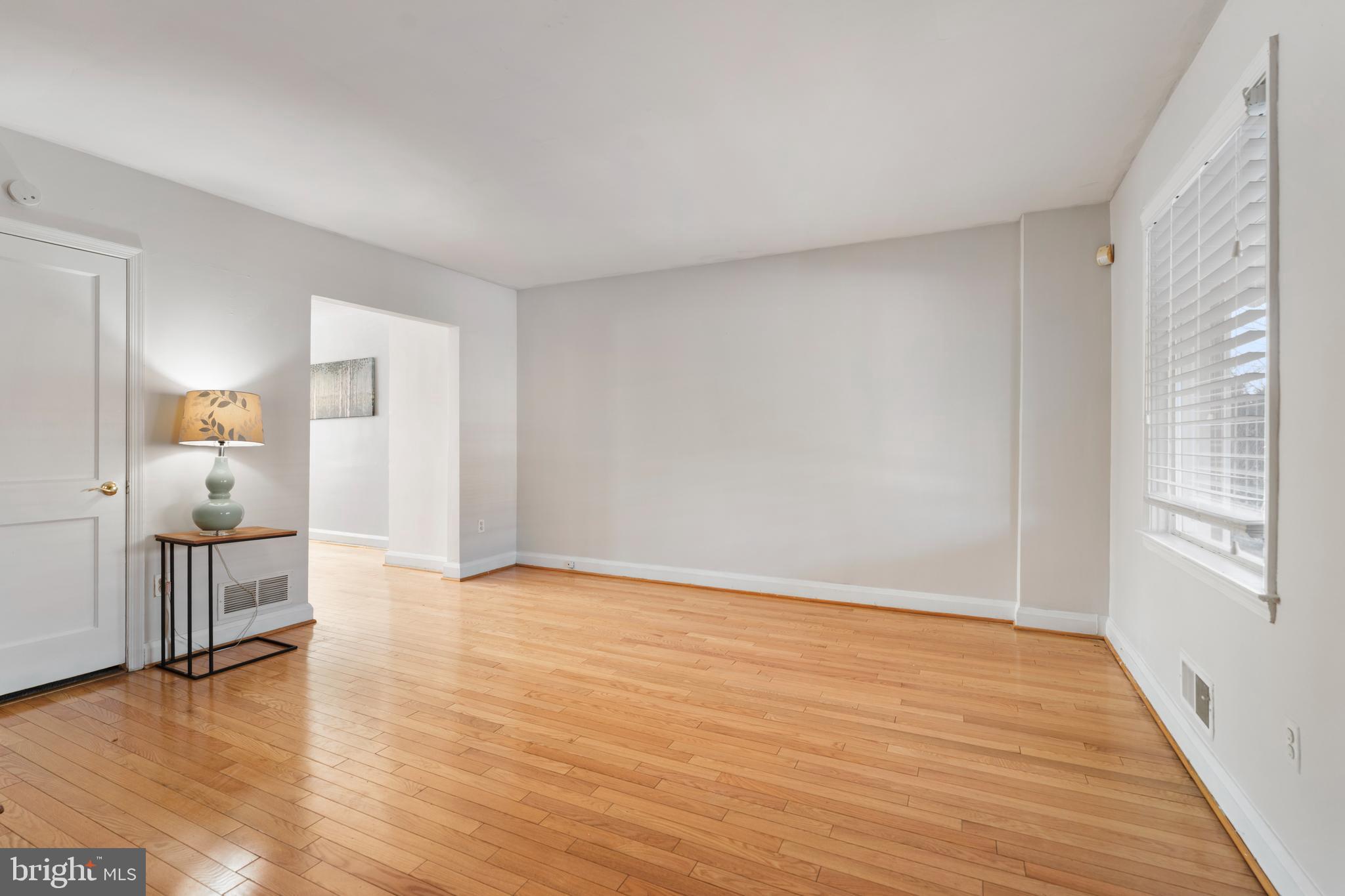 404 Grovethorn Road Baltimore, MD 21220 - Photo 7 of 39 a view of empty room with wooden floor