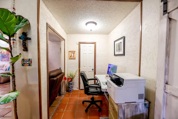 a bathroom with a sink and mirror