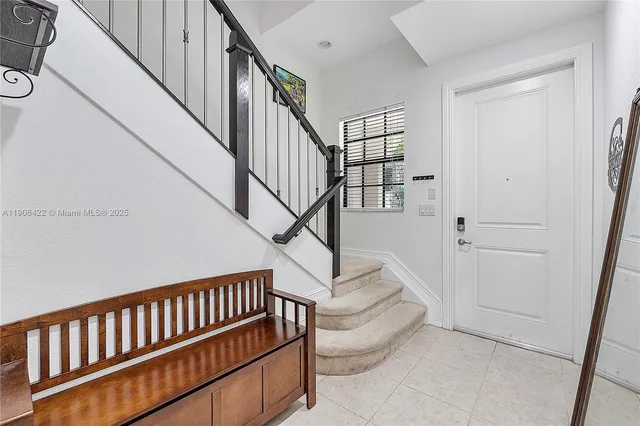 a view of entryway with wooden floor