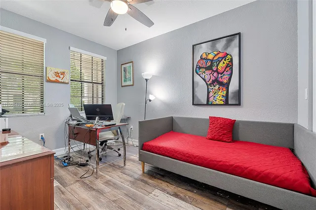 a bedroom with a bed and furniture