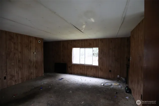 a view of empty room with windows