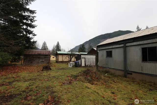 a house view with a backyard space