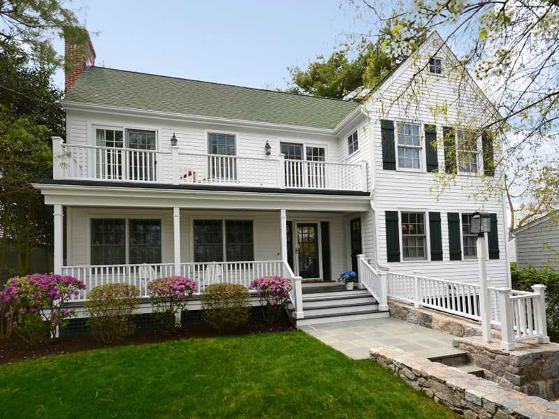 12 Ensign Road Rowayton, CT 06853 - Photo 1 of 24 a front view of a house with garden and porch