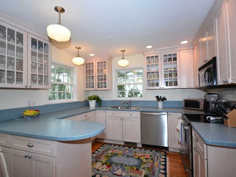 12 Ensign Road Rowayton, CT 06853 - Photo 11 of 24 a kitchen with a sink a counter space cabinets and appliances