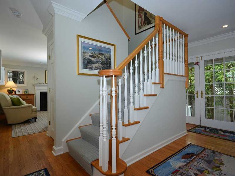 12 Ensign Road Rowayton, CT 06853 - Photo 13 of 24 a view of entryway and hall with wooden floor