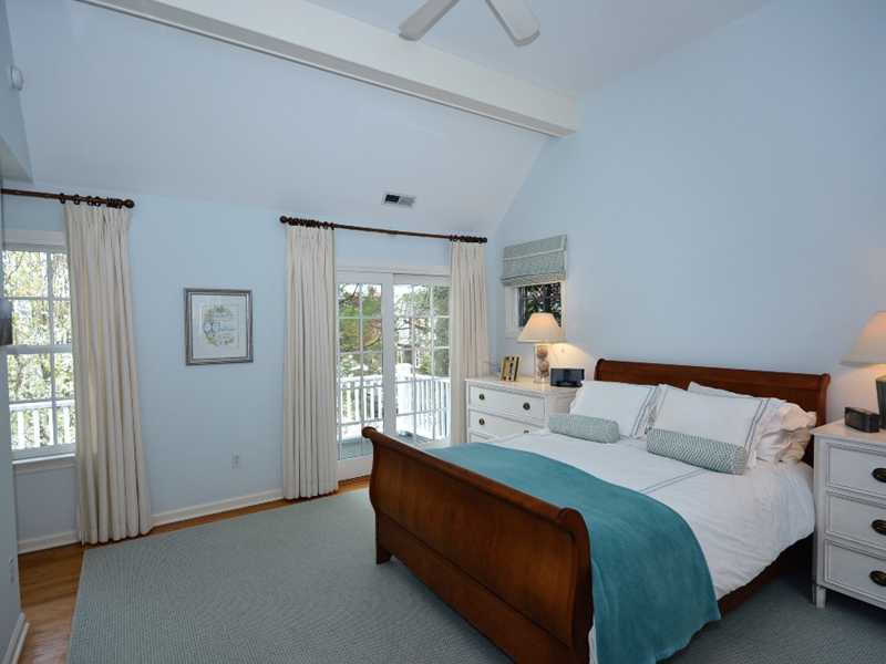 12 Ensign Road Rowayton, CT 06853 - Photo 14 of 24 a bed room with a bed and a window