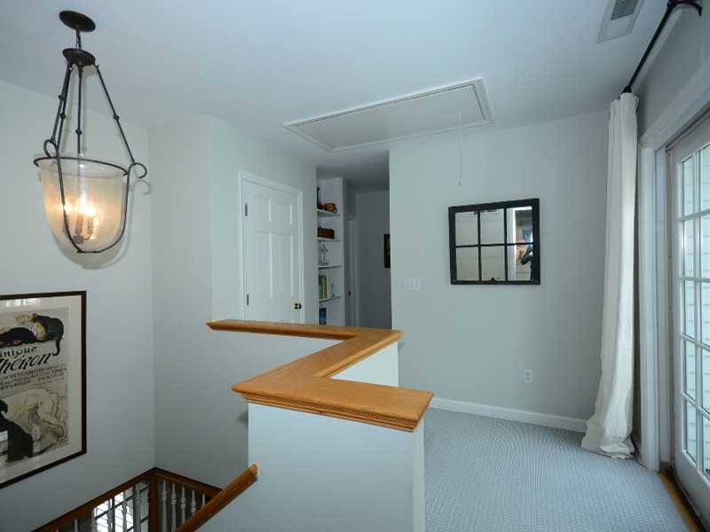 12 Ensign Road Rowayton, CT 06853 - Photo 18 of 24 a view of an entryway with wooden floor