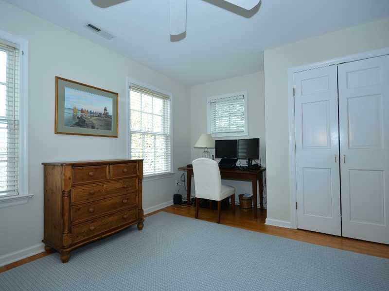 12 Ensign Road Rowayton, CT 06853 - Photo 21 of 24 a livingroom with window and a dresser