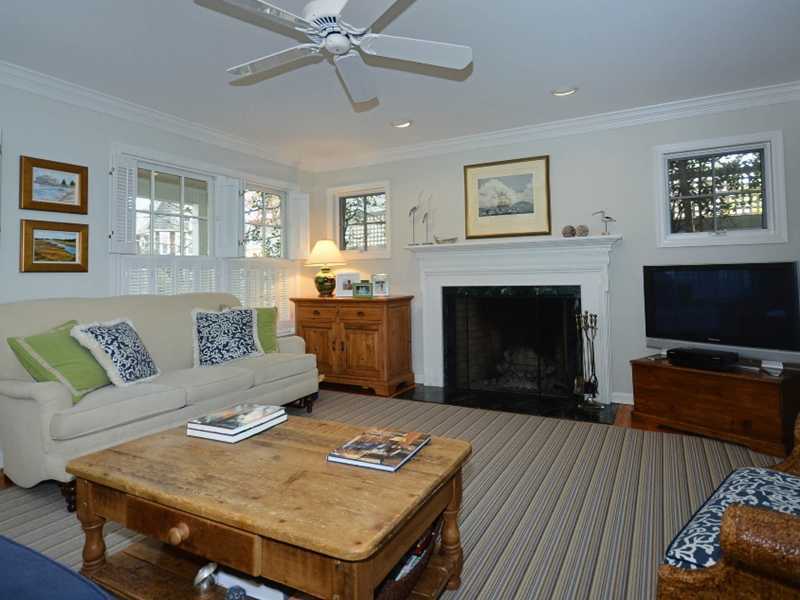 12 Ensign Road Rowayton, CT 06853 - Photo 7 of 24 a living room with furniture and a fireplace