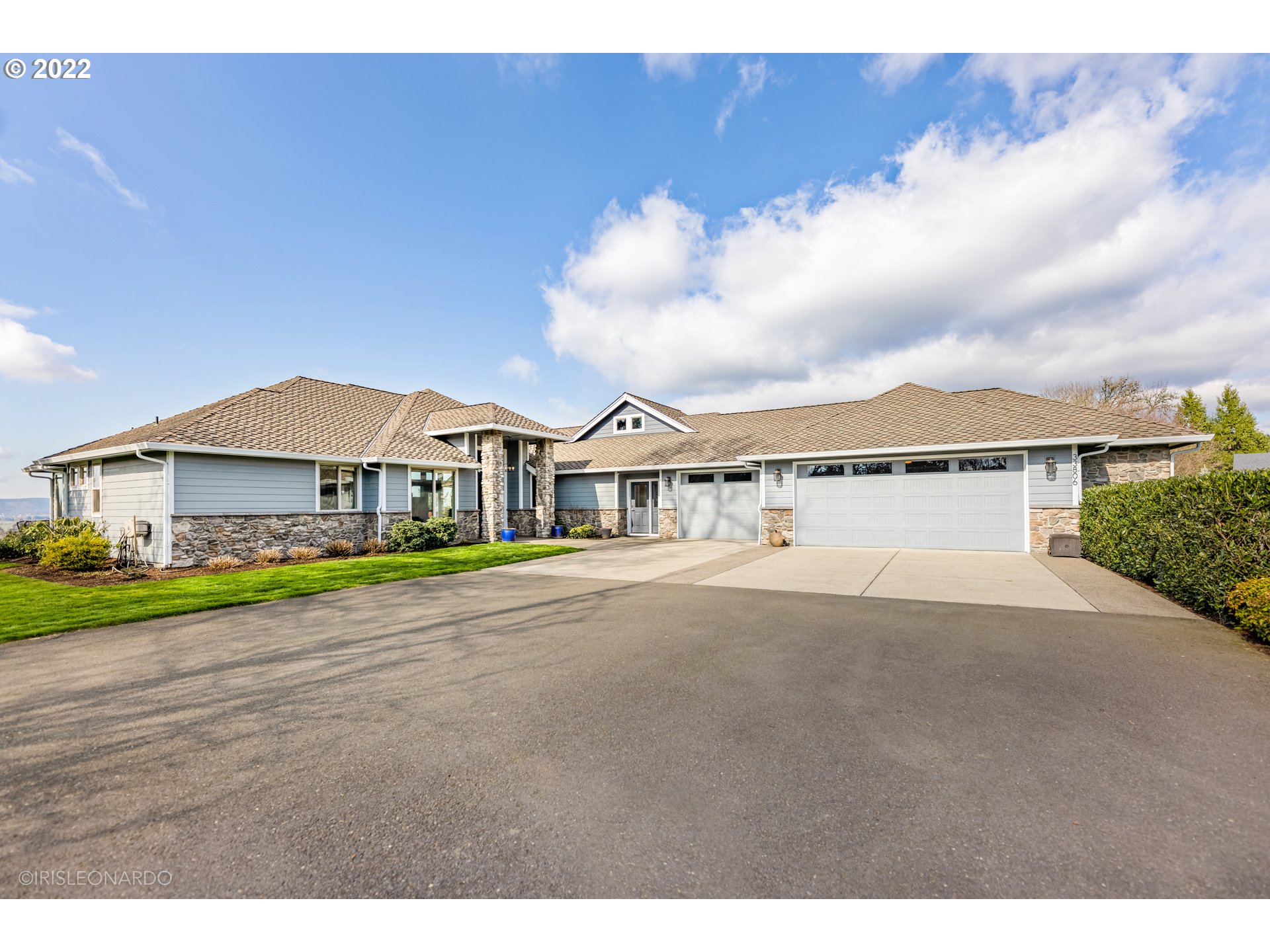 33806 Northwest Norstar Ranch Road Ridgefield, WA 98642 - Photo 6 of 32 a front view of house with yard and green space
