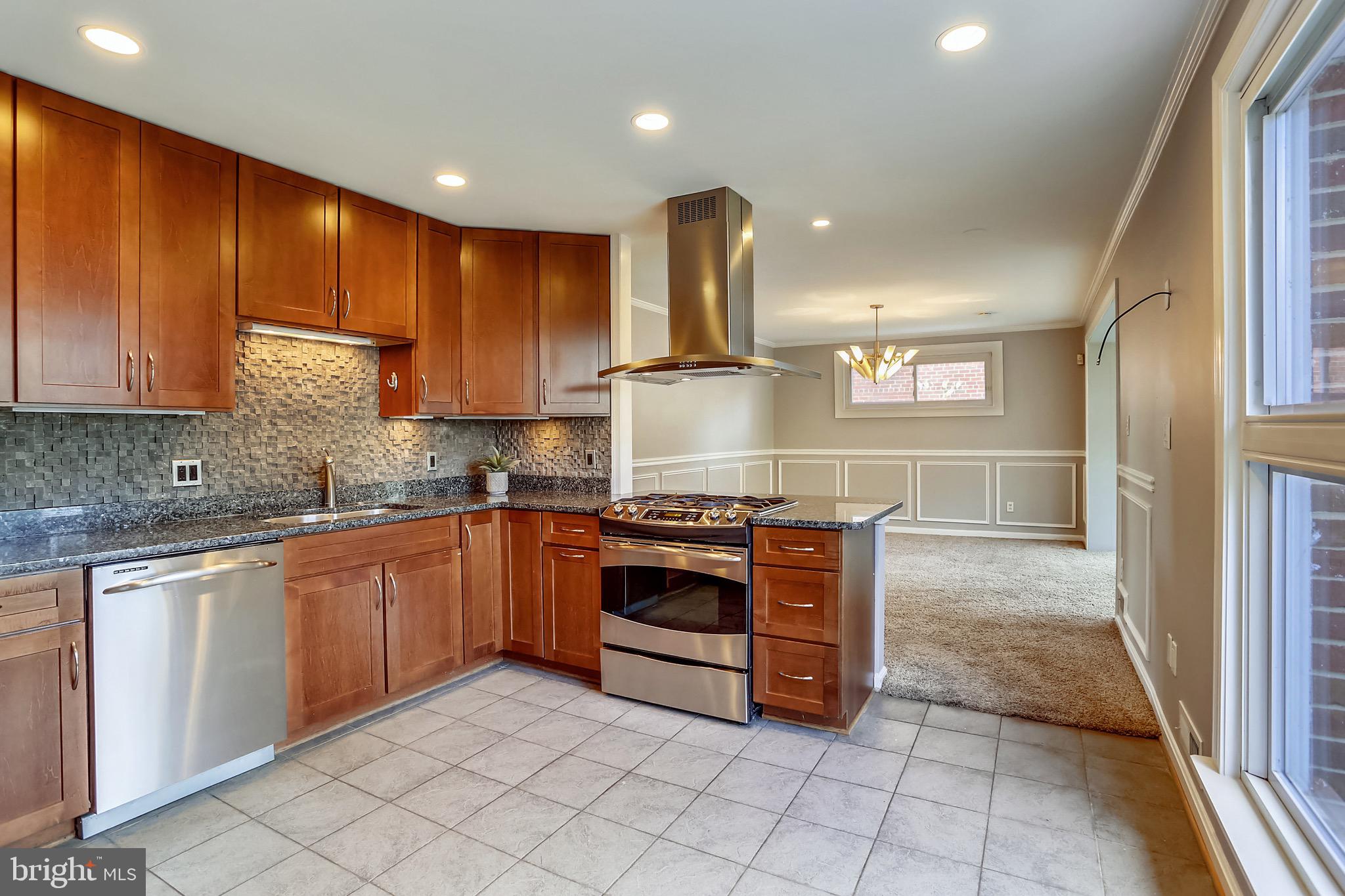 12907 Dean Road Silver Spring, MD 20906 - Photo 10 of 33 42" cabinetry, under cabinet lighting