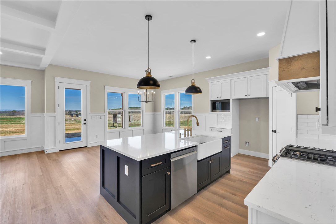2816 Smith McGee Road Iva, SC 29655 - Photo 10 of 25 A gourmet kitchen boasts a generous island with ample counter space and abundant natural light.