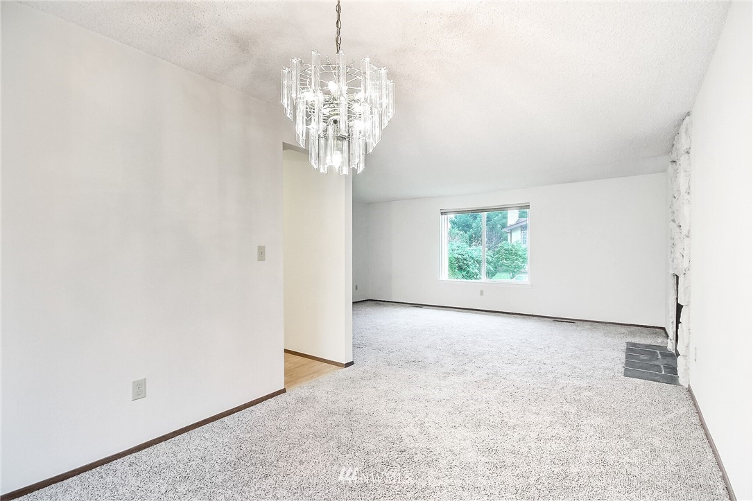 2209 Southeast 21st Street Renton, WA 98055 - Photo 11 of 40 a view of a chandelier in big room and chandelier