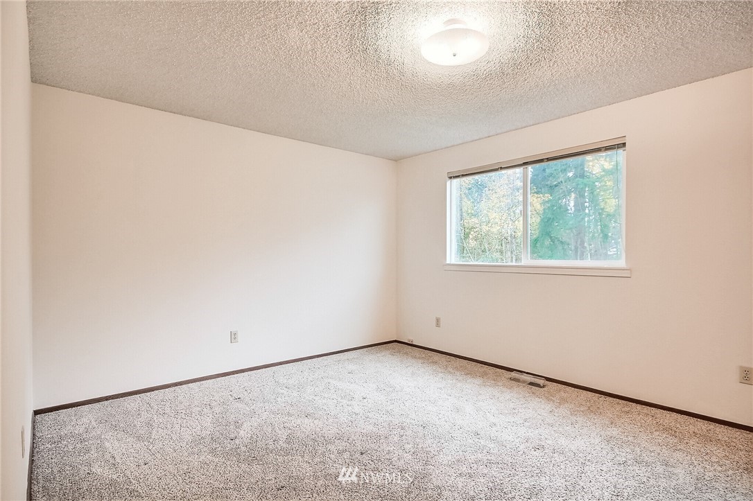 2209 Southeast 21st Street Renton, WA 98055 - Photo 17 of 40 an empty room with windows
