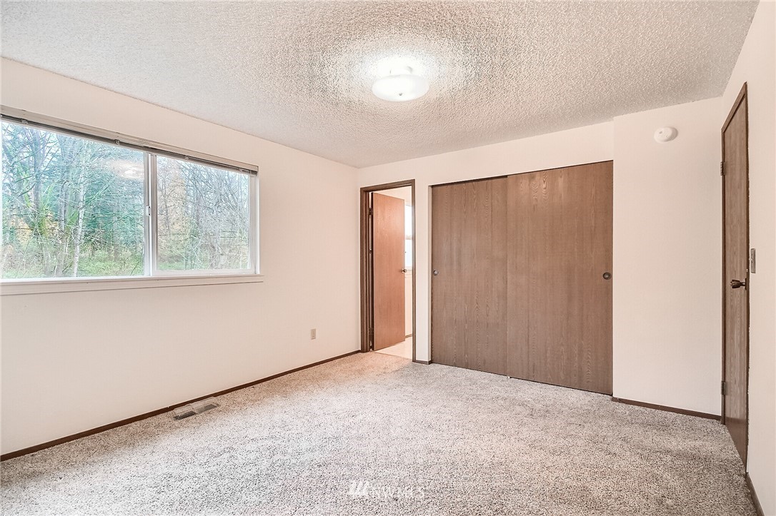 2209 Southeast 21st Street Renton, WA 98055 - Photo 18 of 40 an empty room with a window