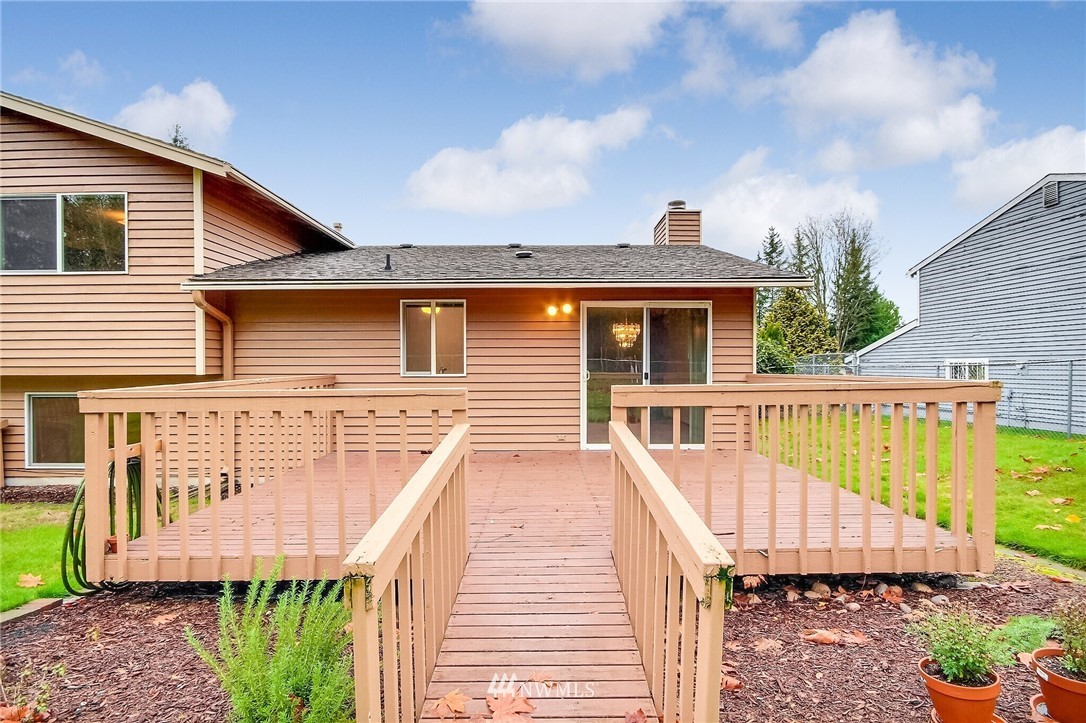 2209 Southeast 21st Street Renton, WA 98055 - Photo 31 of 40 a front view of a house with a yard