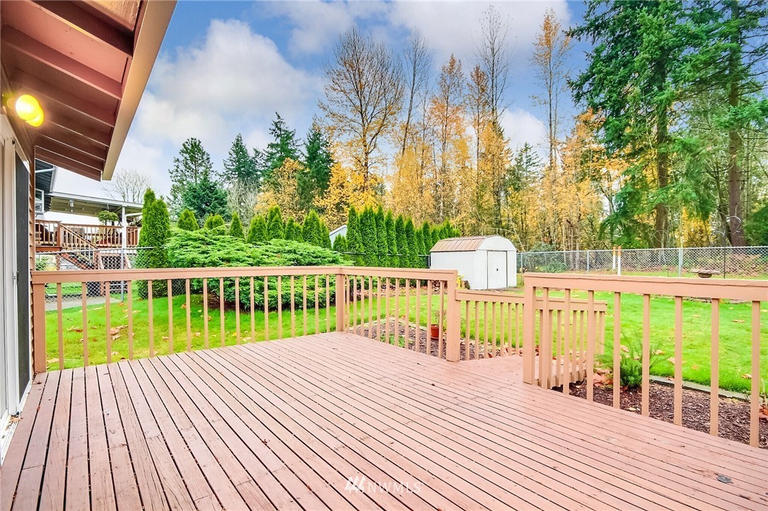 2209 Southeast 21st Street Renton, WA 98055 - Photo 33 of 40 a view of a house with a wooden deck