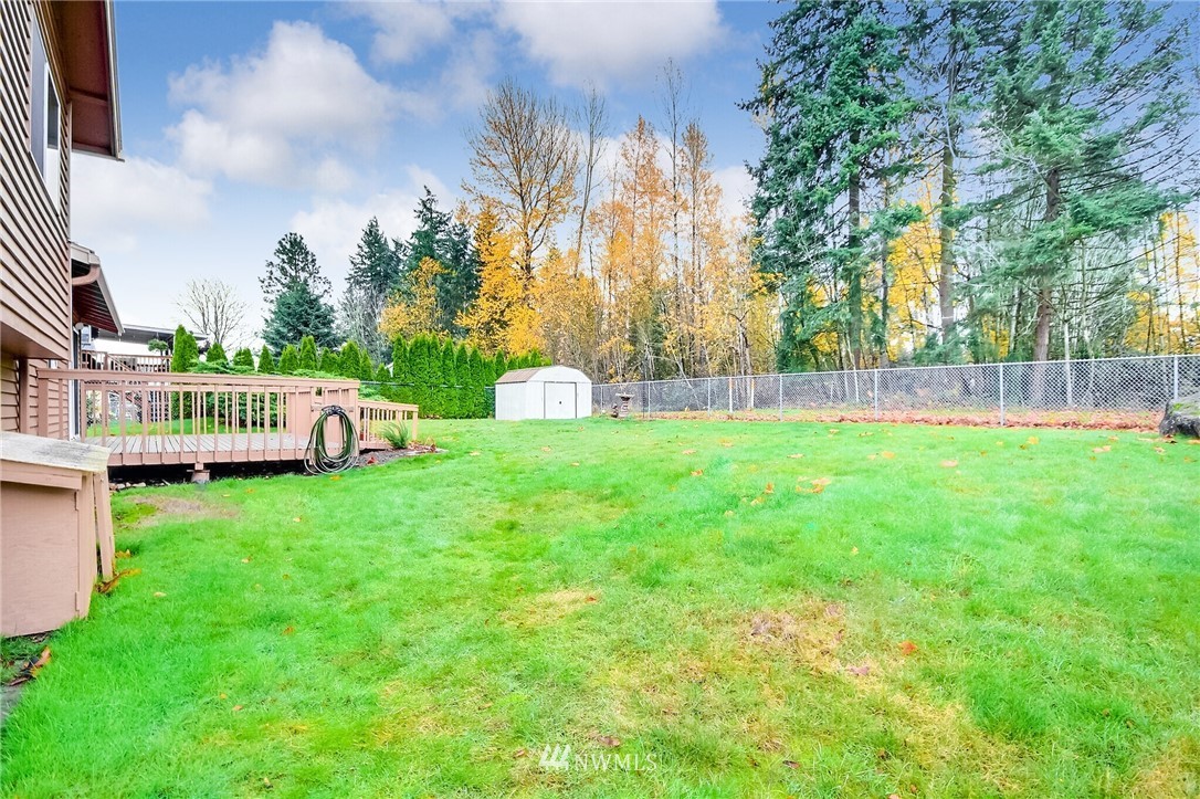 2209 Southeast 21st Street Renton, WA 98055 - Photo 35 of 40 a view of garden with deck in the backyard