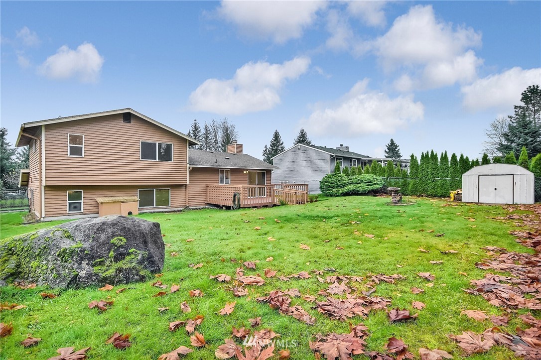 2209 Southeast 21st Street Renton, WA 98055 - Photo 36 of 40 a front view of a house with garden