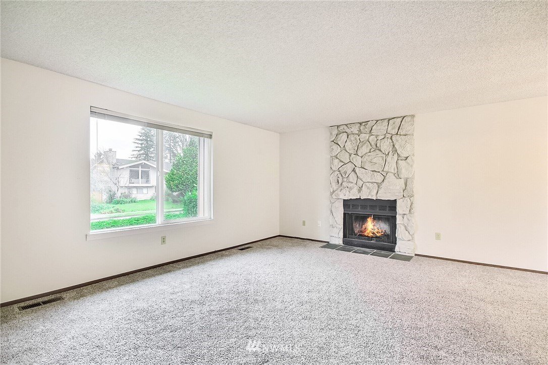 2209 Southeast 21st Street Renton, WA 98055 - Photo 6 of 40 an empty room with windows