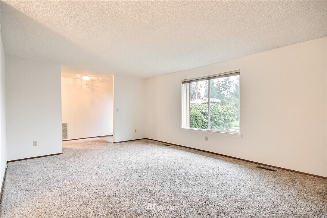 2209 Southeast 21st Street Renton, WA 98055 - Photo 7 of 40 an empty room with a window