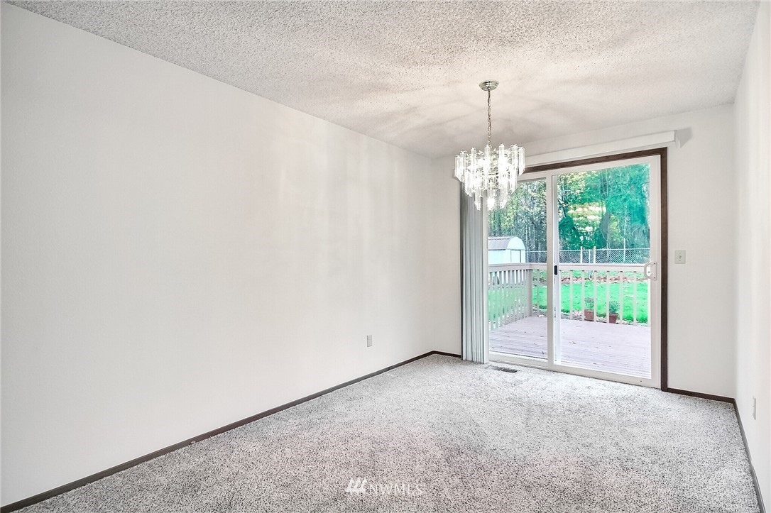 2209 Southeast 21st Street Renton, WA 98055 - Photo 10 of 40 a view of an empty room with windows