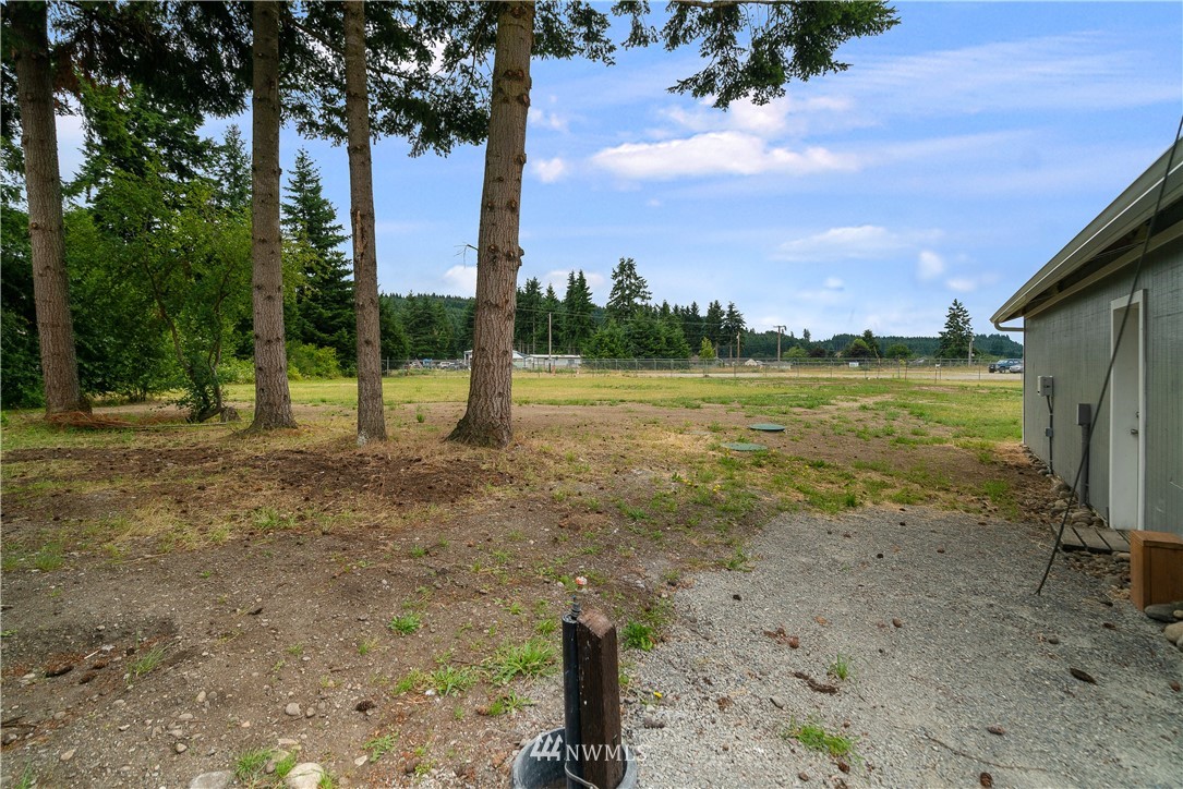 3925 183rd Avenue Southwest Rochester, WA 98579 - Photo 19 of 33 a view of a lake with a yard