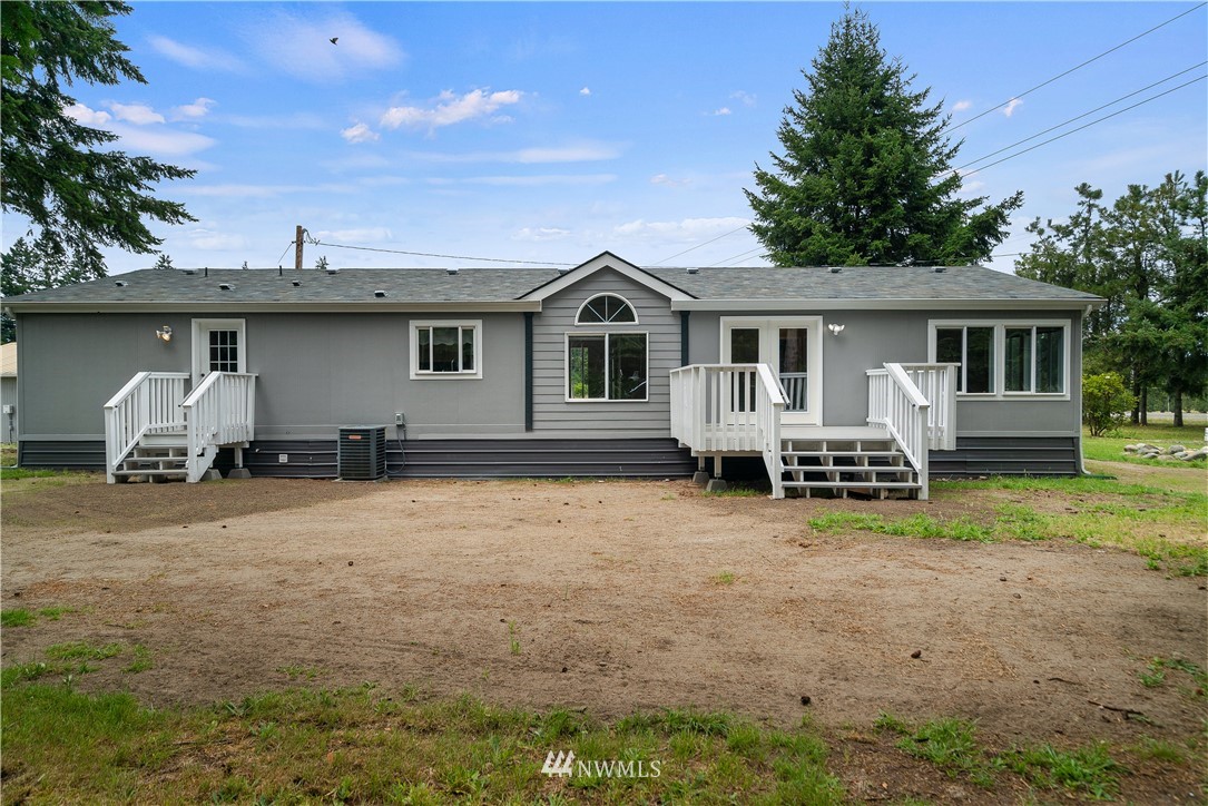 3925 183rd Avenue Southwest Rochester, WA 98579 - Photo 20 of 33 a house view with a garden space