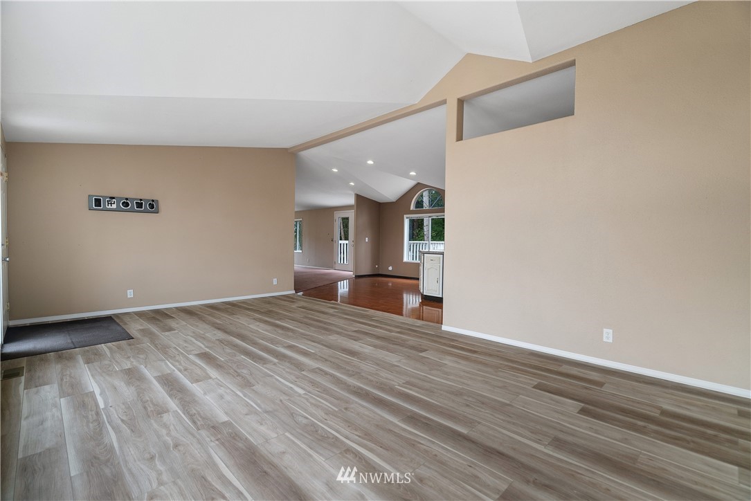 3925 183rd Avenue Southwest Rochester, WA 98579 - Photo 3 of 33 a view of empty room with wooden floor