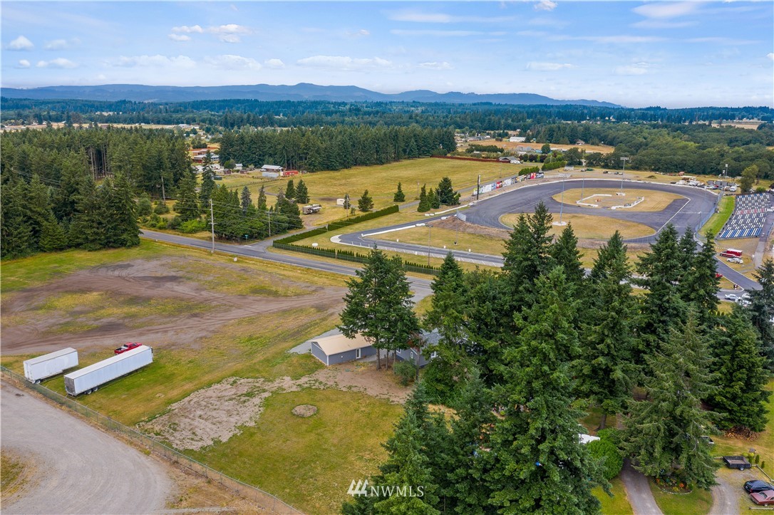 3925 183rd Avenue Southwest Rochester, WA 98579 - Photo 27 of 33 an aerial view of a house with a garden