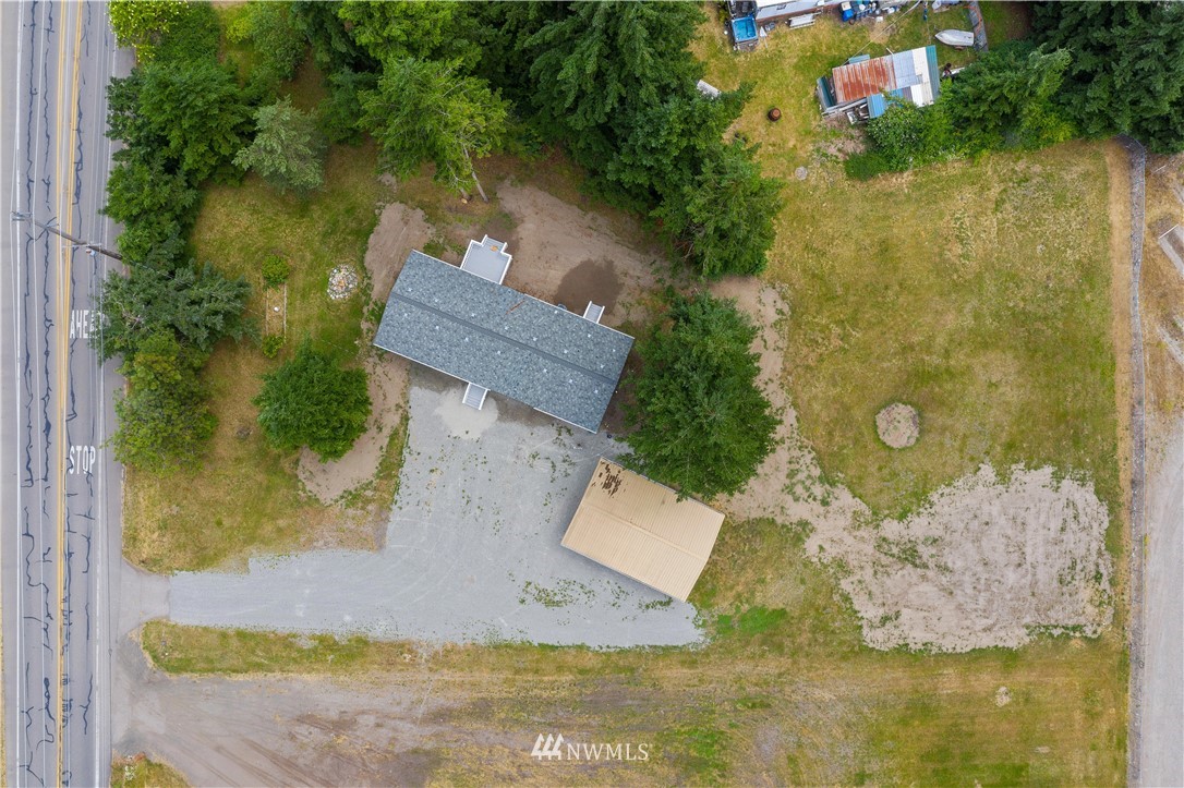 3925 183rd Avenue Southwest Rochester, WA 98579 - Photo 33 of 33 an aerial view of a house with a yard basket ball court and outdoor seating