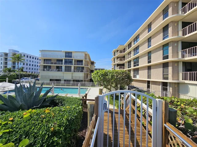 a view of a building with a street