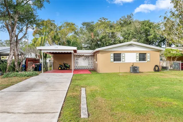 a front view of a house with yard