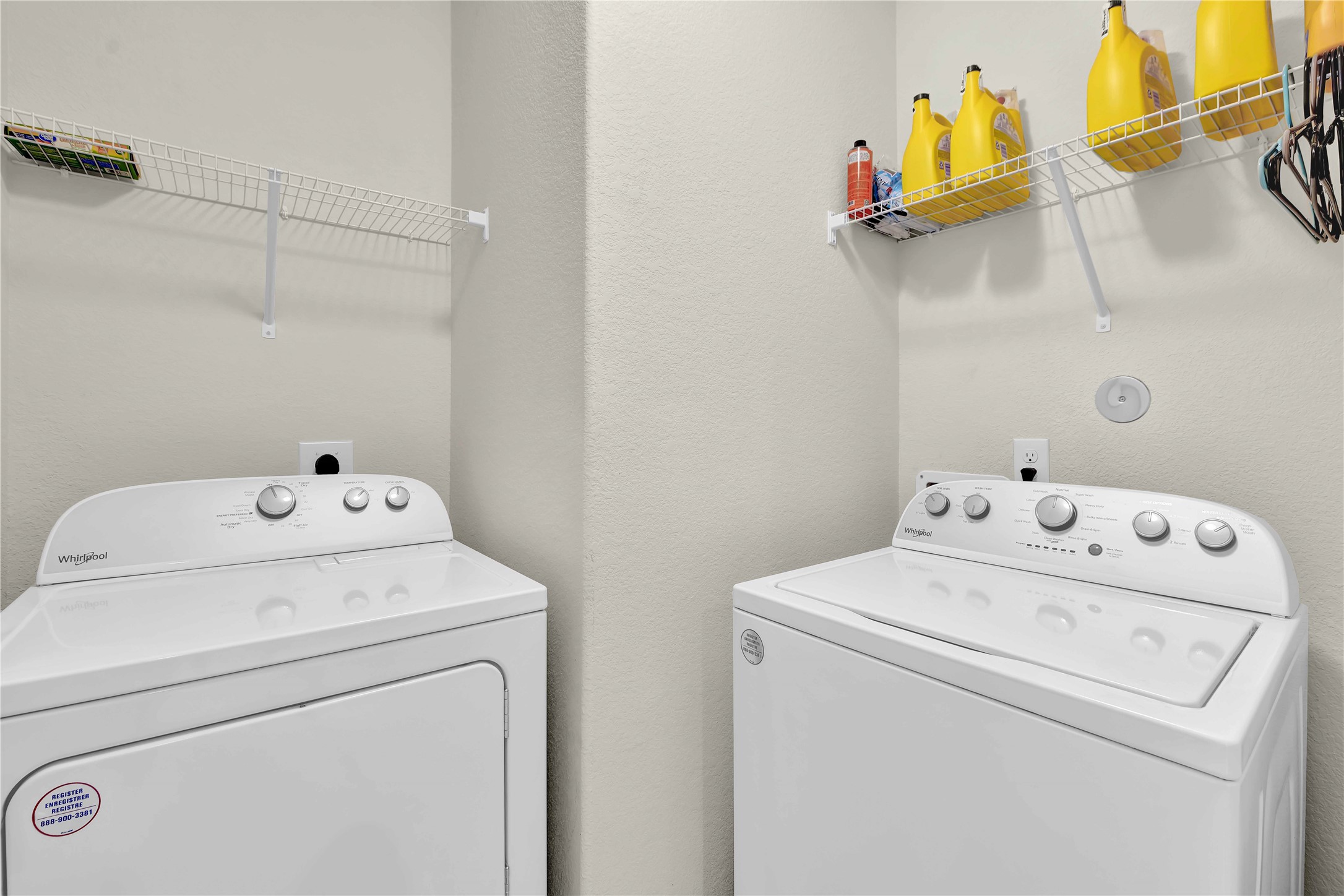 17703 Lion Heart Road Conroe, TX 77306 - Photo 23 of 26 a utility room with dryer and washer