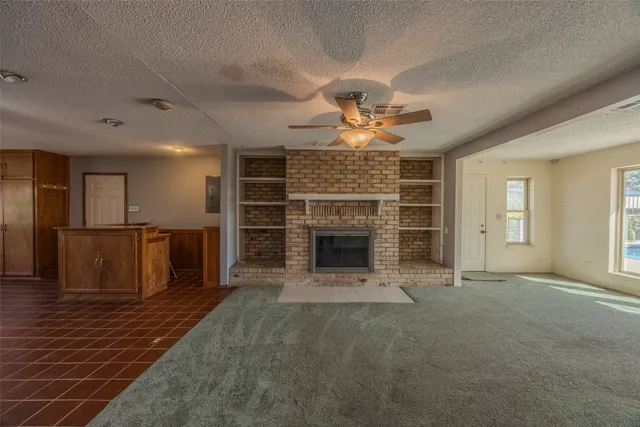 a view of a livingroom with a fireplace