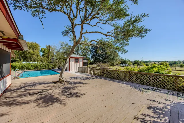 a view of a yard and front view of a house
