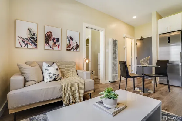 a living room with furniture and a table