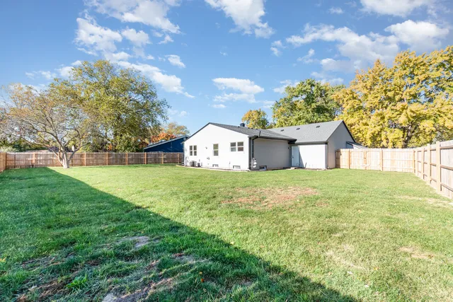 a house view with garden space