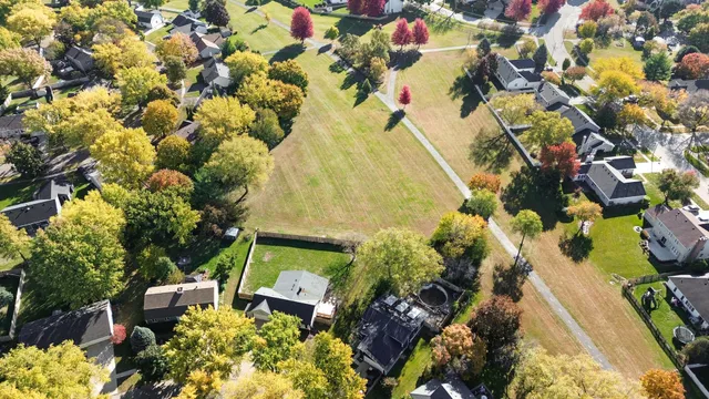 a backyard of a house with lots of green space