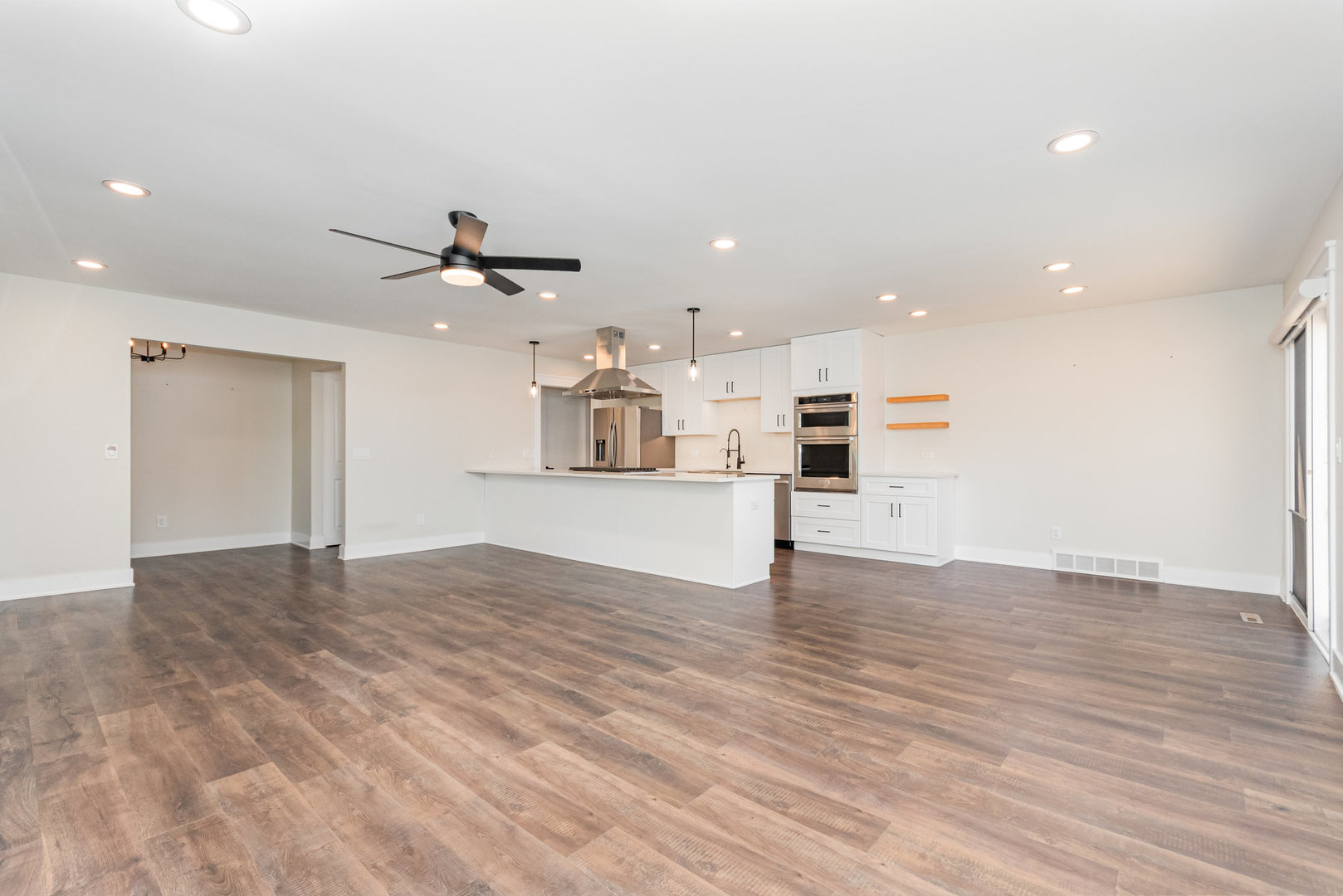 22 Sherwick Road Oswego, IL 60543 - Photo 4 of 29 a view of a kitchen with a sink and a stove