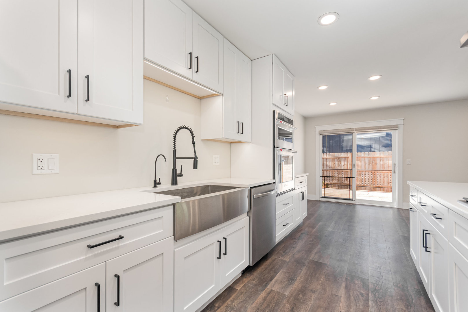 22 Sherwick Road Oswego, IL 60543 - Photo 9 of 29 a kitchen with granite countertop a sink stainless steel appliances and cabinets
