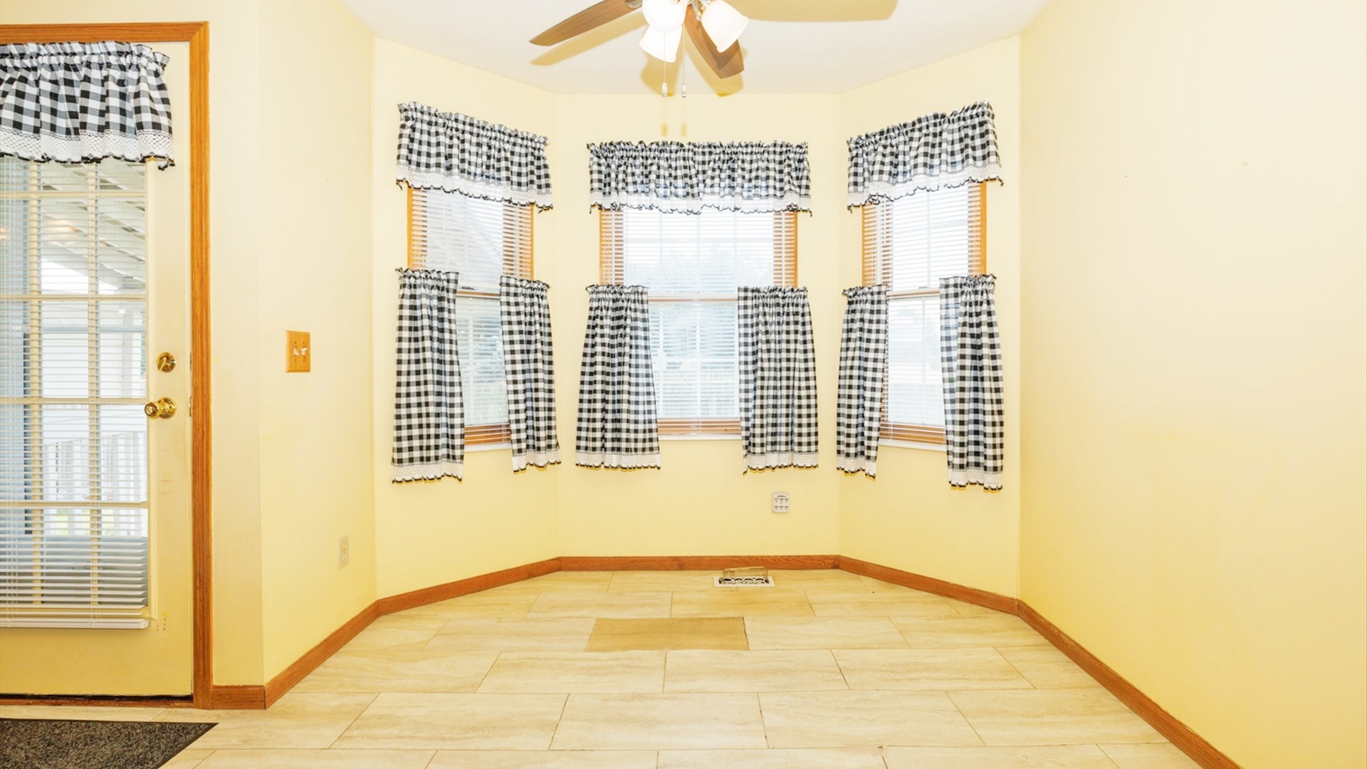 411 Wildberry Drive Normal, IL 61761 - Photo 11 of 51 a view of a bathroom with a large window
