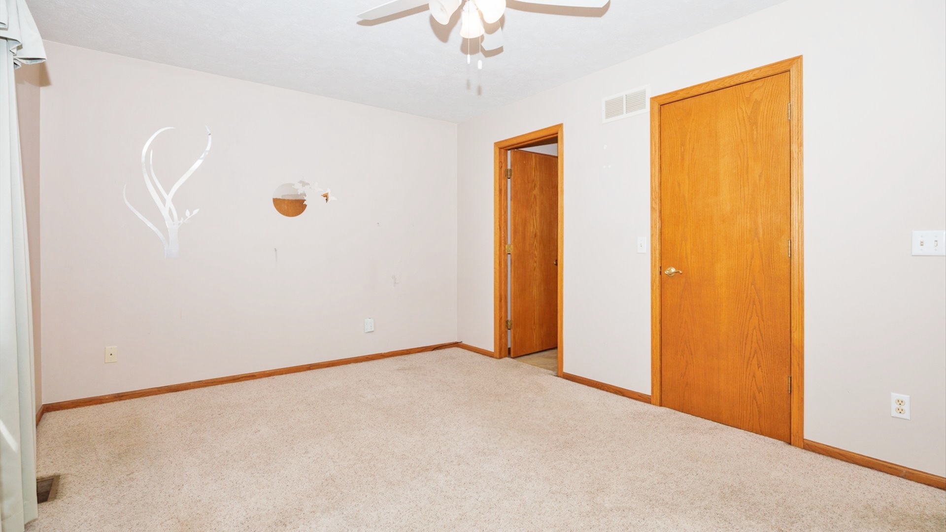 411 Wildberry Drive Normal, IL 61761 - Photo 22 of 51 a view of an empty room with a window