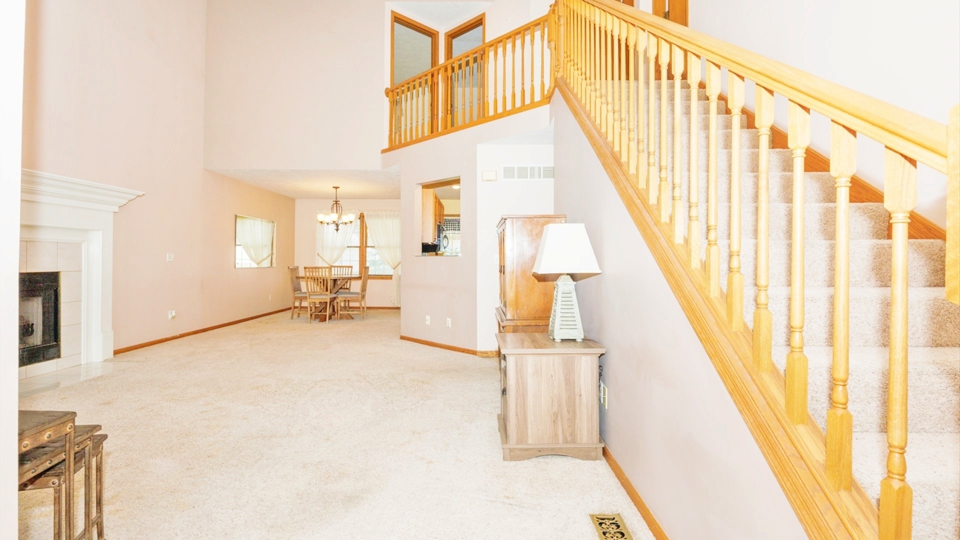 411 Wildberry Drive Normal, IL 61761 - Photo 26 of 51 a view of staircase with large window