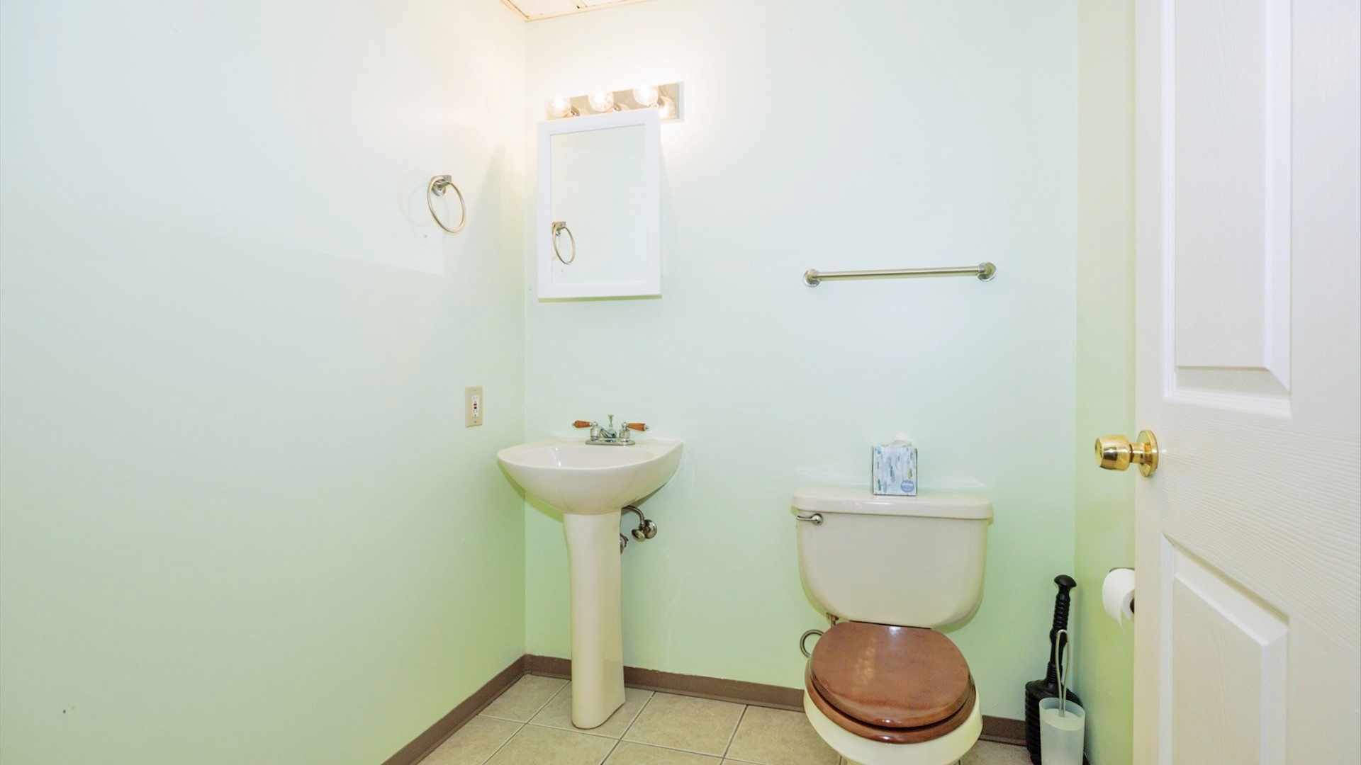 411 Wildberry Drive Normal, IL 61761 - Photo 45 of 51 a bathroom with a sink a toilet and a mirror