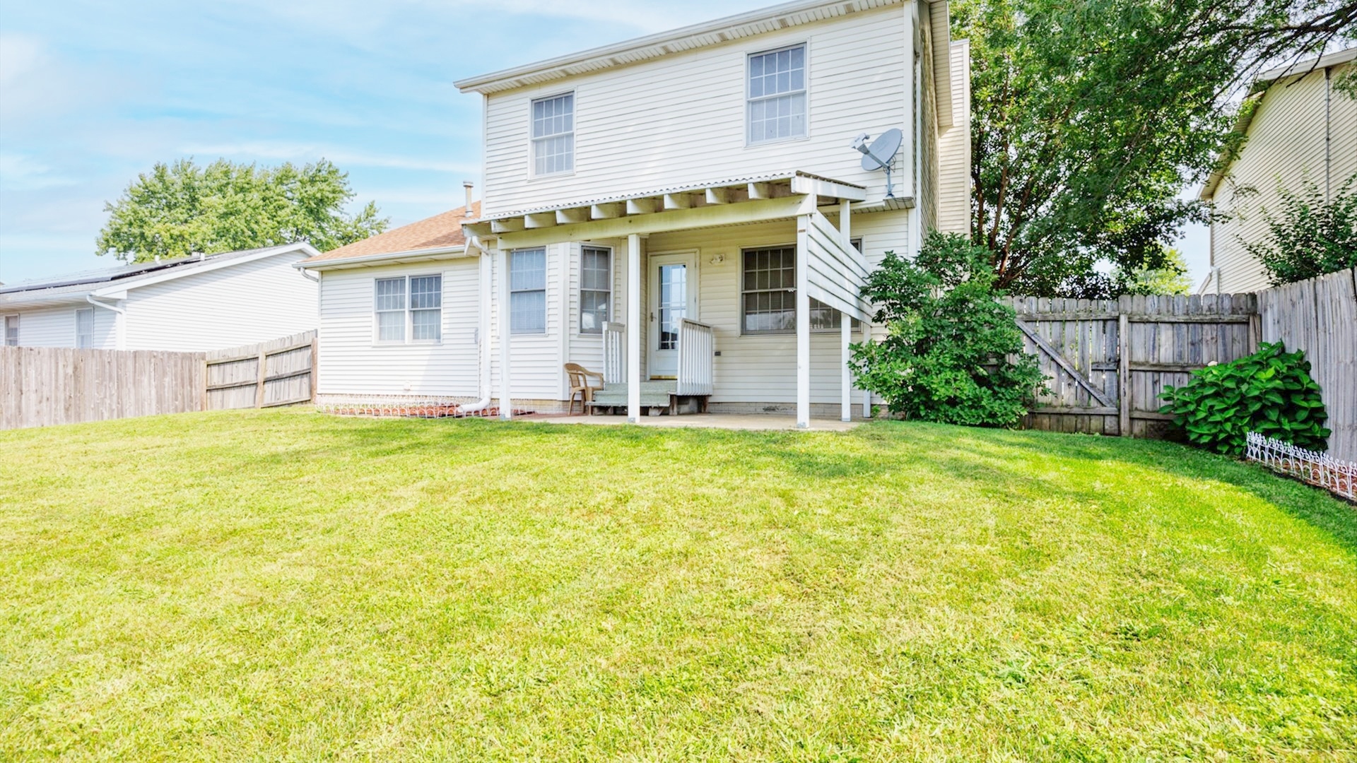 411 Wildberry Drive Normal, IL 61761 - Photo 47 of 51 a view of a house with pool and garden