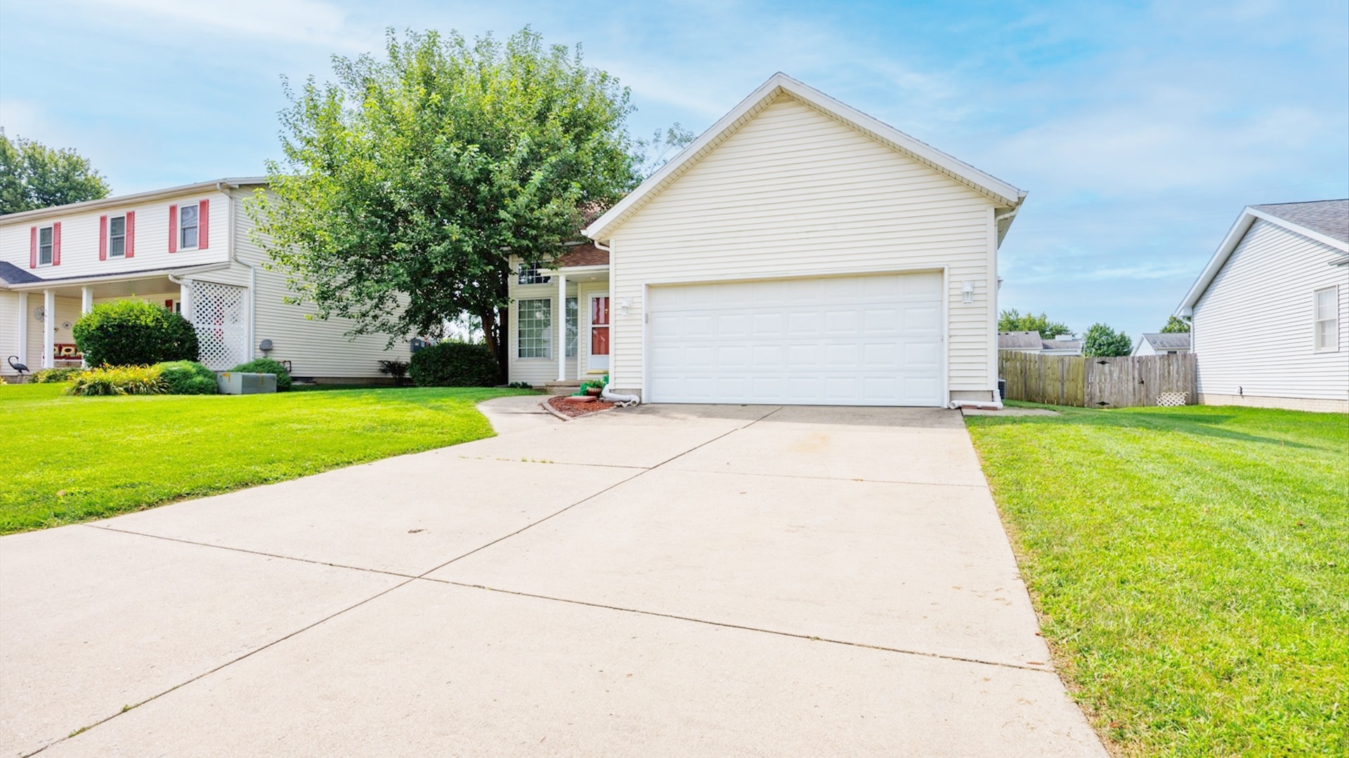 411 Wildberry Drive Normal, IL 61761 - Photo 50 of 51 a front view of house with yard and green space